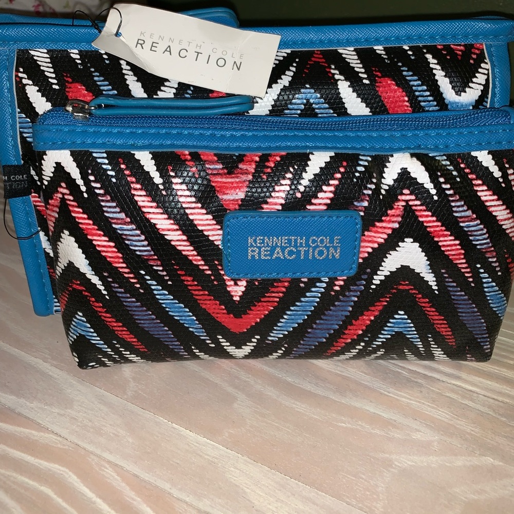 Kenneth Cole Reaction cosmetic bags.